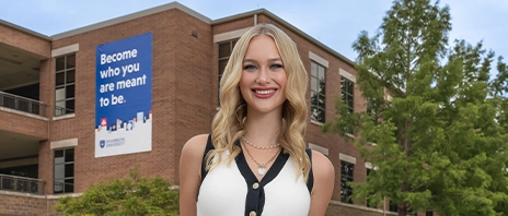 Loryn Heil '26 smiles into the camera.